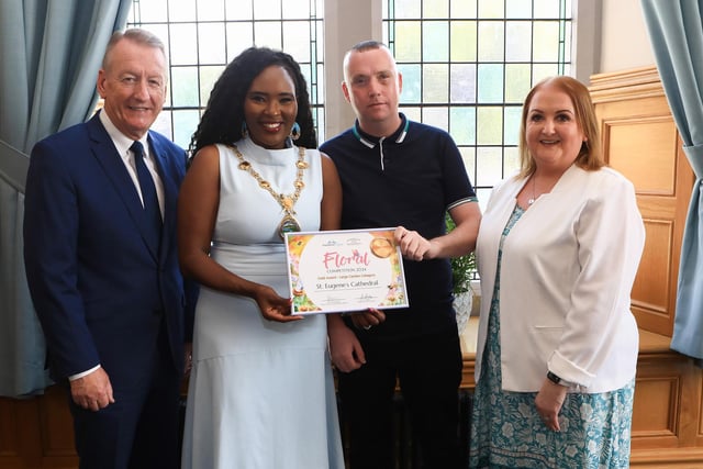 Mayor Lilian Seenoi Barr presents the City Centre Initiative Floral Competition 2024 Gold Award (Large Garden Category) to Gareth Coyle and Anne Marie Hickey of St. Eugene's Cathedral. Included on the left Jim Roddy, CEO of City Centre Initiative. (Photo - Tom Heaney, nwpresspics)
