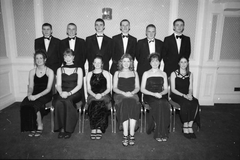 Seated, from left, Lorna Baird, Julie Cummings, Sara Stokes, Laura Wells, Emma Griffith and Tracey Curtis. Standing, from left, Stephen Craig, Thomas Stokes, James Brewer, D.J. Hunter, David Burke and Andrew Kennedy. Pictured at the Foyle College formal in January 1998.