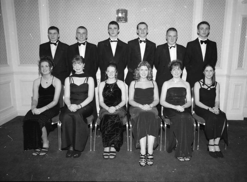 Seated, from left, Lorna Baird, Julie Cummings, Sara Stokes, Laura Wells, Emma Griffith and Tracey Curtis. Standing, from left, Stephen Craig, Thomas Stokes, James Brewer, D.J. Hunter, David Burke and Andrew Kennedy. Pictured at the Foyle College formal in January 1998.