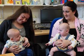 On left Destiny Harkin with baby Odin, and, on right, Orlaith Clancy, with baby Amara.