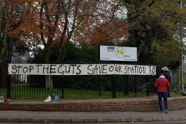 Banner on the railings outside BBC Radio Foyle, on Northland Avenue during a recent protest against proposed cuts to jobs and services by BBC Northern Ireland as part of a cost-cutting and restructuring project. Photo: George Sweeney. DER2248GS – 27