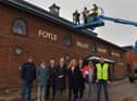 Mayor Sandra Duffy pictured with Destined ‘s Caroline O’Hara (in the Cherry Picker)at the unveiling the new replacement clock at the Foyle Valley Railway Museum on Wednesday afternoon.  Included in the photograph are Destined’s CEO Dermot O’Hara, Project Manager Charlene Keenan, Kevin Cregan of Foyle Builders and Destined members. The replacing of the clock was the final stage in the refurbishment works at the museum.  Photo: George Sweeney. DER2304GS – 21