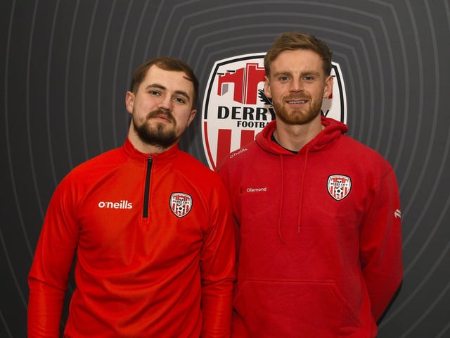 Candystripe fan Darragh McGonigle pictured with Derry City's Rob Slevin at the club's merchandise outlet in Foyleside Shopping Centre. Photo: George Sweeney
