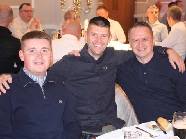 Derry City media man, Caolán McGinley and members of the Derry City Merchandise Committee who organised the event, Gary Slevin and Kieran Doyle.