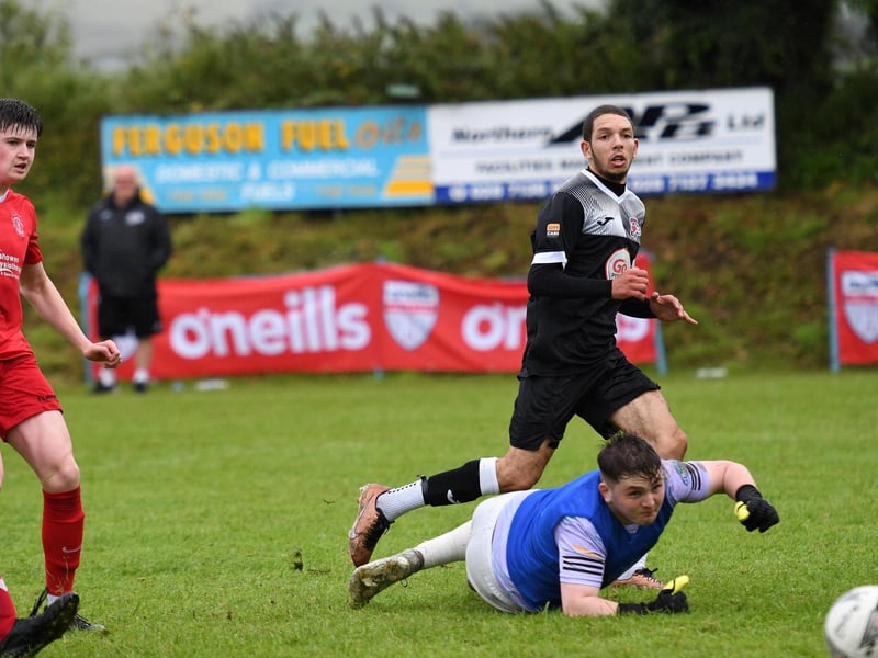 Maiden City Under-19's forward Sam Watton slides the ball past Carndonagh keeper' Zach Conlon only to watch it hit the post. (Photo: Keith Moore)