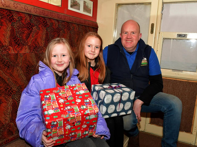 Smiles from Anna, Zoe and Gareth at the Christmas Wonderland at Destined, organised by the Western Trust Children’s Disability Team and the Destined Team. Photo: George Sweeney