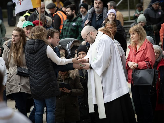 Candles being blessed during Saturday's Rosary in Guildhall Square.
