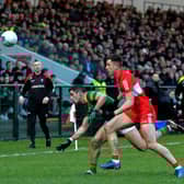 Meath captain Donal McKeogan and Derry’s Shane McGuigan battle for possession during the Allianz Football League game at Owenbeg on Saturday. Photo: George Sweeney. DER2308GS – 54