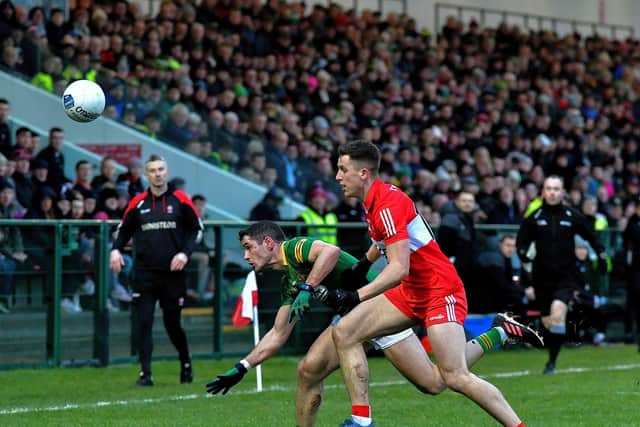 Meath captain Donal McKeogan and Derry’s Shane McGuigan battle for possession during the Allianz Football League game at Owenbeg on Saturday. Photo: George Sweeney. DER2308GS – 54