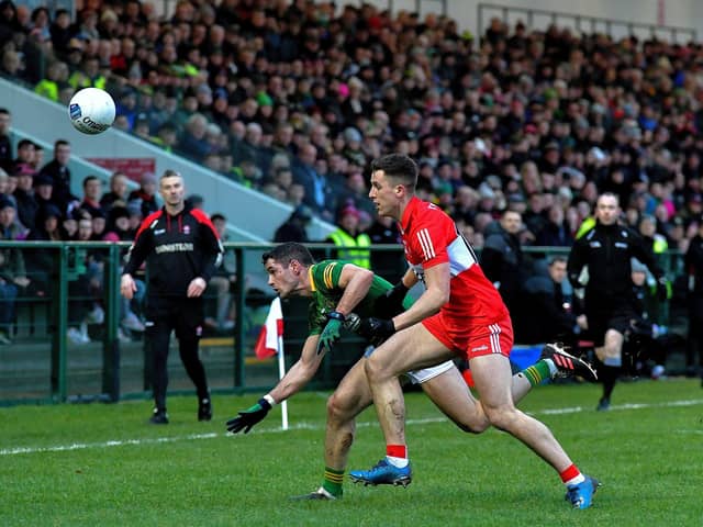 Meath captain Donal McKeogan and Derry’s Shane McGuigan battle for possession during the Allianz Football League game at Owenbeg on Saturday. Photo: George Sweeney. DER2308GS – 54