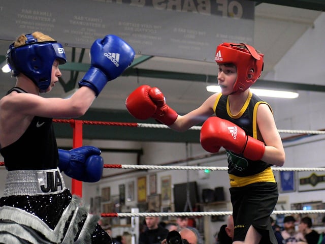 Oakleaf’s Joshua Cairns, left, boxing Clonmany’s Liam Weatherall.  Photo: George Sweeney