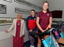 Student Katie McArthur, Lisneal College, and Megan Cairns, Foyle College, pictured with Mayor Sandra Duffy during  a break in their treadmill marathon in aid of Cancer Research UK, at the school on Wednesday morning. Photo: George Sweeney. DER2308GS – 95