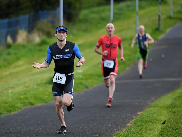 Adam Ward, Strabane Triathlon Club, wins the Liam Ball Triathlon on Sunday Morning. Photo: George Sweeney