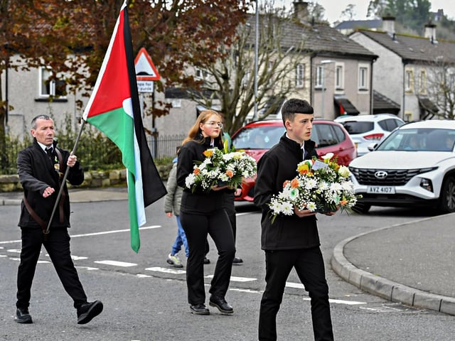 A Palestinian flag is carried during the 109th anniversary of the Easter Rising on Sunday afternoon. Photo: George Sweeney