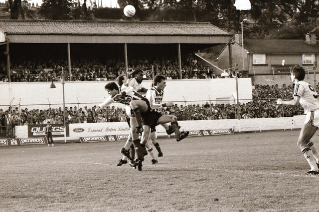 Alan Smith lurks at the back post.