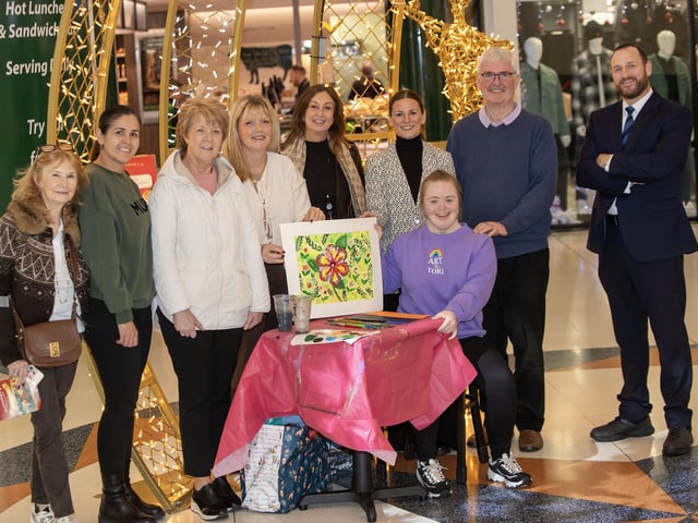WELLWISHERS!. . . .Family and friends pictured at Lisnagelvin Shopping Centre on Wednesday to wish artist Tori McNeill all the best in her new venture. (Photos: Jim McCafferty Photography)