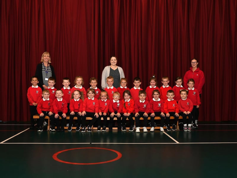 Mrs Semple, centre, with her P1 class at Drumahoe Primary School.  Included in the photo are classroom assistants Mrs Allen and Mrs Curry.