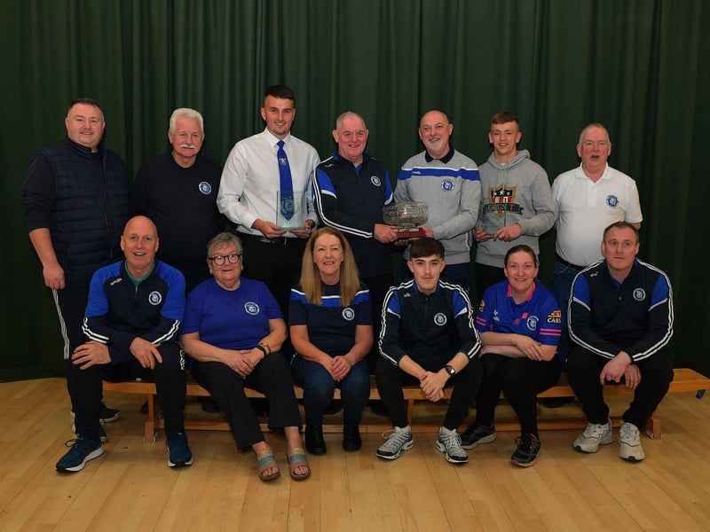 Trojans FC Hall of Fame award winners Joe and Paul Doherty (fourth and fifth from left) pictured at the club’s annual prizegiving with Derry City’s Ciaron Harkin and the club’s committee members. Photo: George Sweeney