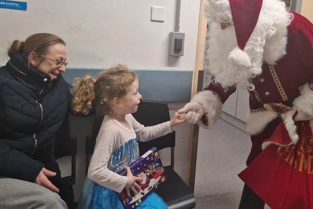 Santa Claus with Grace Carlin.