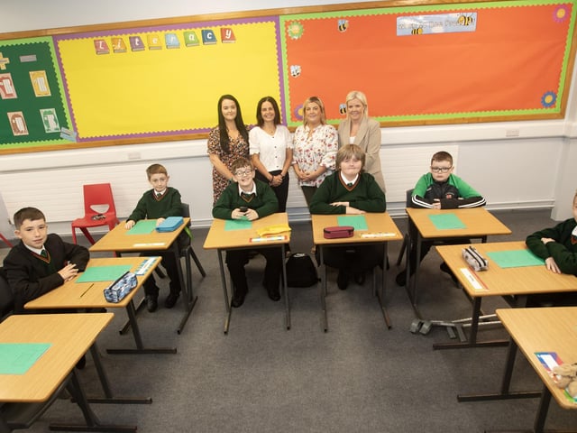 FIRST CLASS!. . . .New Year 8 students at St. Joseph's Boys School pictured on their first day on Monday morning. At back are Miss Doherty, Classroom Assistant, Mrs. Doherty, Classroom Assistant, Miss Toland, ASC teacher and Miss Shiels, Primary Schools. Co-Ordinator. : St. Joseph's Boys School welcomes latest influx of Year 8 pupils