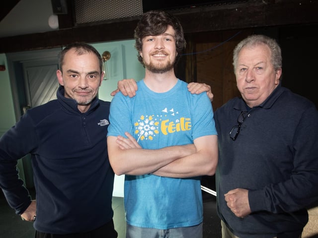 Film maker Ruairi Campbell pictured with the O'Kane's - Eugene Junior and Eugene Senior at Tuesday's film launch.