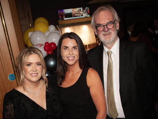 Gala Ball host Tim McGarry pictured with Cheryl McGurk and Emma Kevitt on Saturday night.
