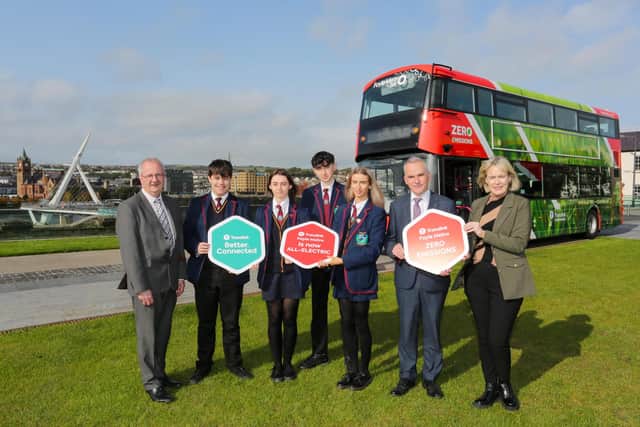 Pupils from Oakgrove Integrated College pictured with John Harkin, School Principal, Chris Conway, Translink Group Chief Executive, and Sarah Simpson, Business Change Manager, Translink.