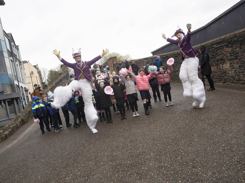 Easter Bonnet Fun on the city's walls during Wednesday's Derry Feile event.