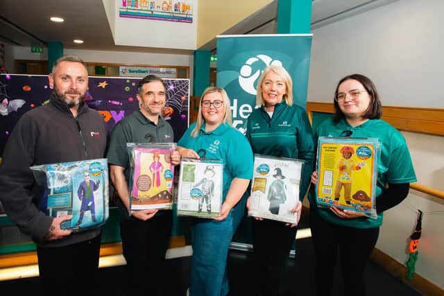 Dan Doherty and John Allen of Click Energy alongside Natasha Burke, Family Support Hub Coordinator, Mary Breslin, Deputy Director of Health for Life, and Katie Bogle, Student Social Worker.