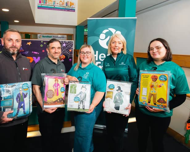 Dan Doherty and John Allen of Click Energy alongside Natasha Burke, Family Support Hub Coordinator, Mary Breslin, Deputy Director of Health for Life, and Katie Bogle, Student Social Worker.