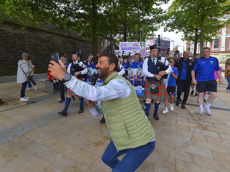 Host Mickey Doherty takes a selfie with Foyle Cup teams arriving at Guildhall Square. Photo: George Sweeney