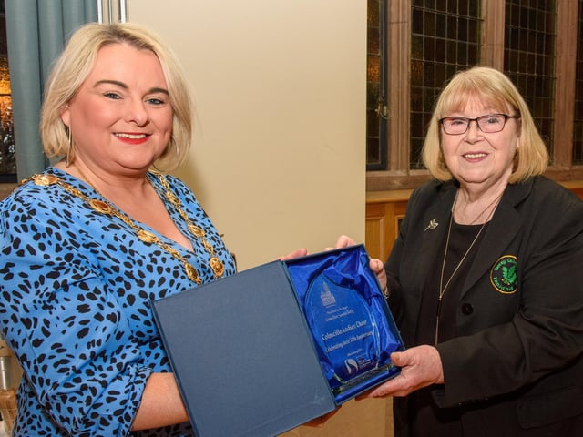 The Mayor Councillor Sandra Duffy pictured with Musicial Director, Sheila Carlin as she welcomed the members of Colmcille Ladies Choir to a reception in the Guildhall as they mark their 50th Anniversary. Picture Martin McKeown. 20.01.23:.