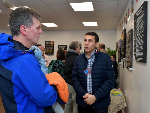 Colr Shaun Harkin chatting with Mohamed at the North West Islamic Association’s centre in Pennyburn during the Tea and Tour day on Sunday last. Photo: George Sweeney. DER2311GS – 02