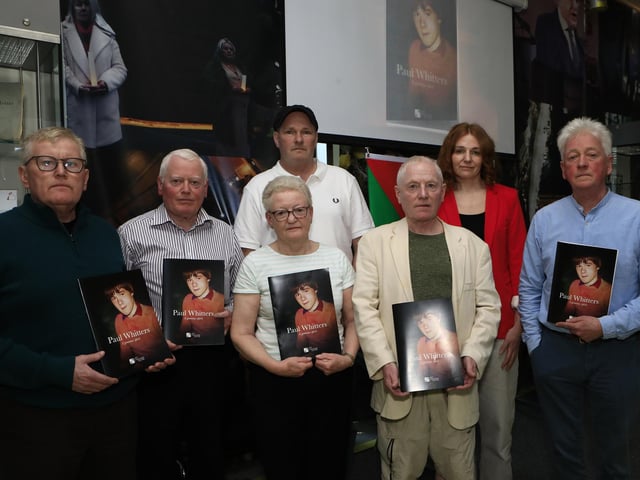 Helen Whitters, mother of 15 years old Paul Whitters, at the launch of a booklet about her beloved son, fatally wounded when an RUC man fired a plastic bullet and struck him in the head on 15th April 1981.  Included from left, are Stephen Brown, Tony Brown, Stuart Ross, researcher, Gerard Brown, Sara Duddy and Paul O'Connor, Pat Finucane Cetnre.  (Photo - Tom Heaney, nwpresspics)