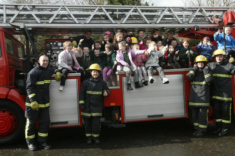 Pupils from Greenhaw PS pictured with firefighters from Blue Watch when they visited Northland Road Fire Station.