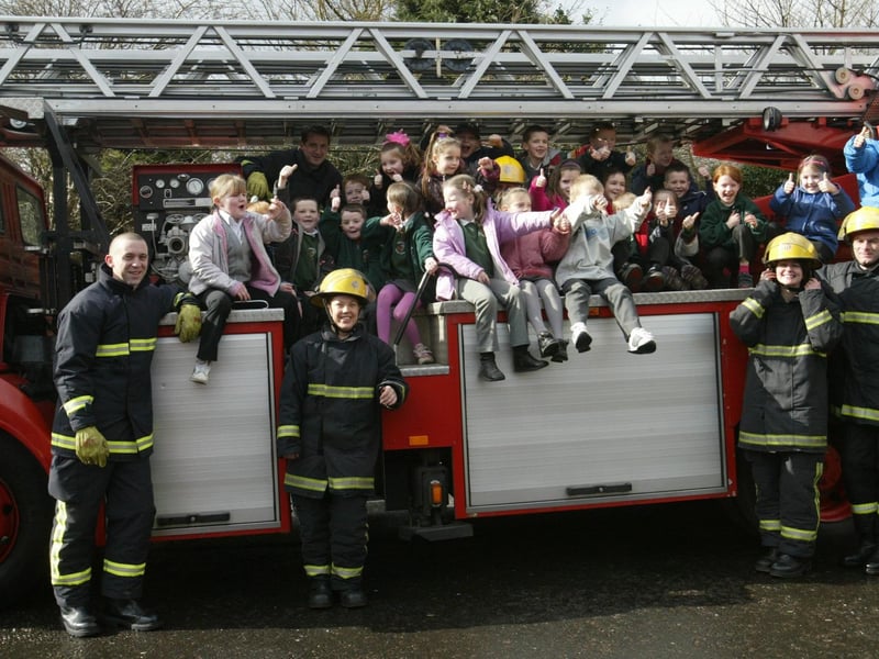 Pupils from Greenhaw PS pictured with firefighters from Blue Watch when they visited Northland Road Fire Station.