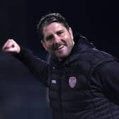 Derry manager Ruaidhri Higgins celebrates at full time