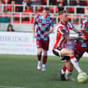 Derry City midfielder Carl Winchester applies the pressure on Drogheda's Shane Farrell.