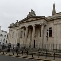 Derry woman who assaulted two people in bar fined £500