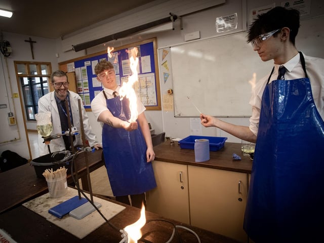 FLAMING HAND!. . . .Mr. McCay and students Rian and Cathal showing off their 'Flaming Hand' skills during an experiment on Open Day at St. Columb's. (Photos: Jim McCafferty Photography) : .
