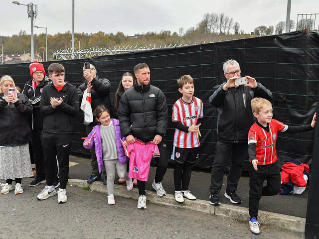 Derry City fans at the Brandywell Stadium on Saturday morning prior to the team’s departure for Dublin ahead of Sunday’s FAI Cup Final against Drogheda United. Photograph: George Sweeney