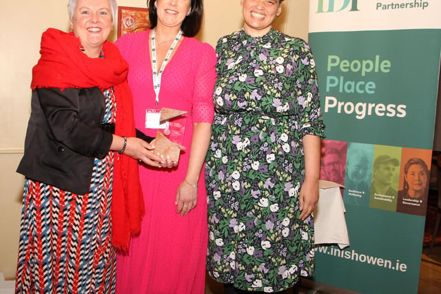 Shauna McClenaghan, CEO Inishowen Development Parnership and Danielle Bonner, Donegal Women's Collective presenting a special award to Aine McLaughlin, IDP 