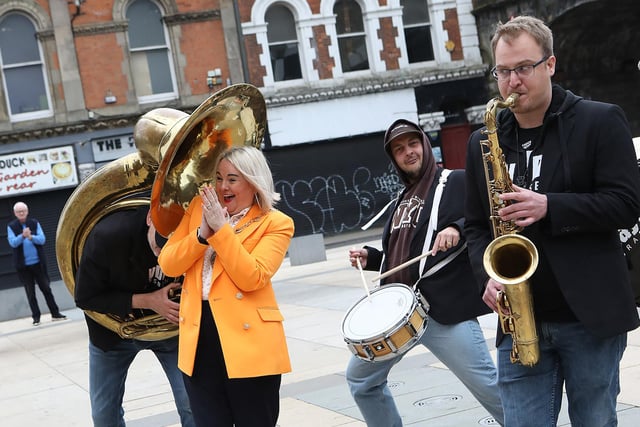Mayor Sandra Duffy "has a blast" at the Jazz Festival with the JayDee Brass Band. (Photo - Tom Heaney, nwpresspics)