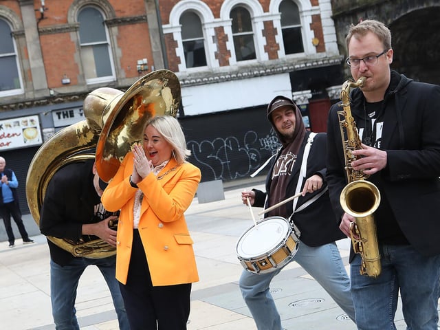 Mayor Sandra Duffy "has a blast" at the Jazz Festival with the JayDee Brass Band. (Photo - Tom Heaney, nwpresspics)