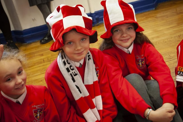 Supporting Derry City are Mia McGuinness, Aoife Bryce and Amelia Bonner at St. Eugene’s PS on Tuesday.