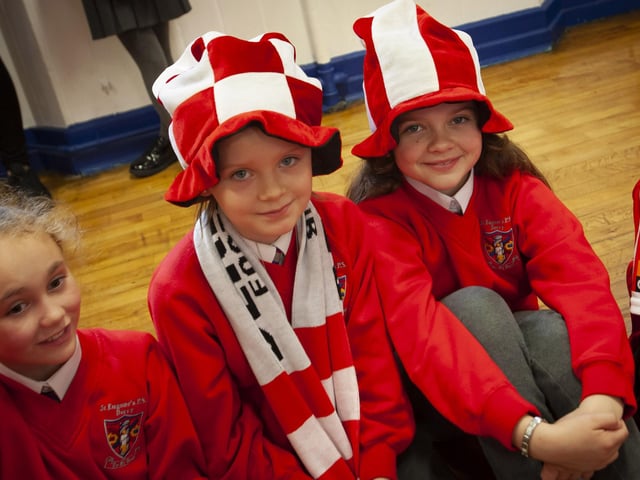Supporting Derry City are Mia McGuinness, Aoife Bryce and Amelia Bonner at St. Eugene’s PS on Tuesday.