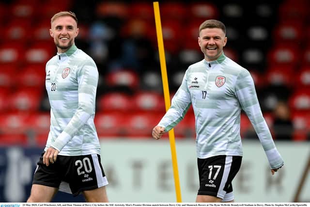 Carl Winchester, left, and former Derry City winger Dom Thomas share a joke. Photo by Stephen McCarthy/Sportsfile