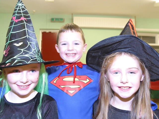 Enjoying the Halloween party in the Ballymacgroarty Centre are Toni Breslin Dillion McMonagle and Chloe Sweeney 9879dd : Derry Parties & Celebrations November 2005: Ballymagroarty Community party.
