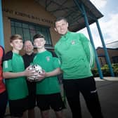 GOOD LUCK BOYS!. . .St. Joseph's Boys School U-14 Captain Corey Harkin and Vice Captain Cian Griffiths are wished the best of luck as they head to the final of the Northern Ireland U-15 Plate against Clounagh Junior High School at the Danny Blanchflower Stadium tomorrow (Wednesday). Included from left are Mr. Stephen Parkhouse, Manchester United Foundation, Mr. Paul Gibbons, Coach/Head of PE, and Mr. Emmett McGinty, PE teacher/coach. (Photos: Jim McCafferty Photography)