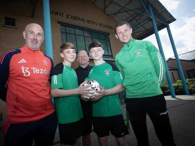 GOOD LUCK BOYS!. . .St. Joseph's Boys School U-14 Captain Corey Harkin and Vice Captain Cian Griffiths are wished the best of luck as they head to the final of the Northern Ireland U-15 Plate against Clounagh Junior High School at the Danny Blanchflower Stadium tomorrow (Wednesday). Included from left are Mr. Stephen Parkhouse, Manchester United Foundation, Mr. Paul Gibbons, Coach/Head of PE, and Mr. Emmett McGinty, PE teacher/coach. (Photos: Jim McCafferty Photography)